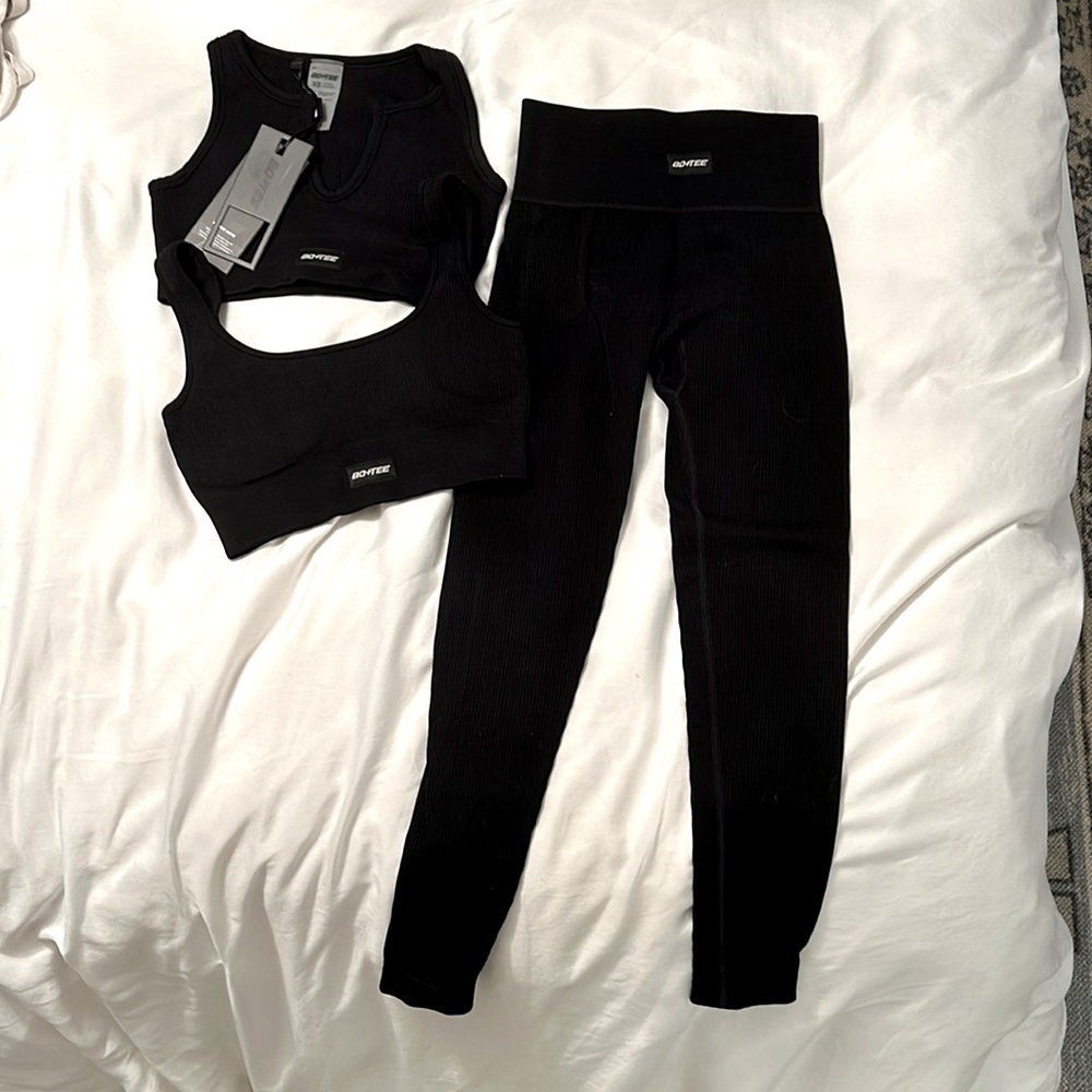 Black Bo+Tee set one pair leggings and two different style sports bras. NWT